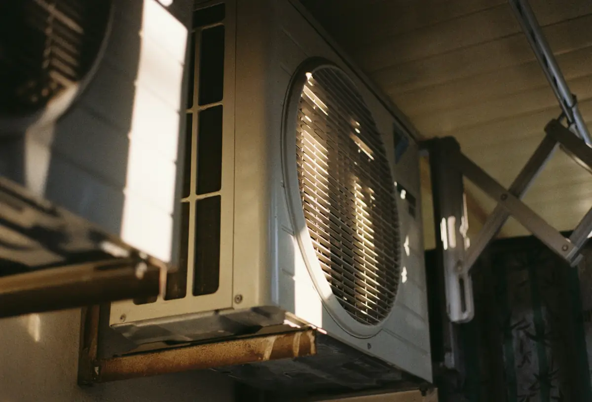Close-up of an outdoor air conditioning unit in the sun