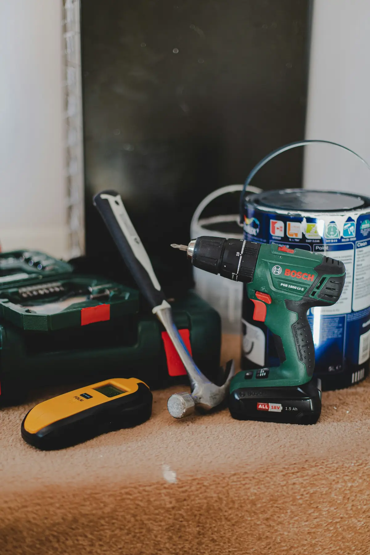Drill, hammer and stud finder